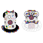 Dress with ruffle accents on the shoulders and girly double ruffle skirt in a dog friendly pattern that shows a multi-colored New Years ball, the words Mommy's Midnight Kiss, a clock, champagne bottle and champagne toast, fireworks, confetti and more on a white background. It's complete with NYE Ball trim on the neck, black ruffles on the shoulders, a black asymmetrical ruffle on top of a NYE Ball ruffle skirt, as well as a coordinating trim under the shoulder ruffles in black.