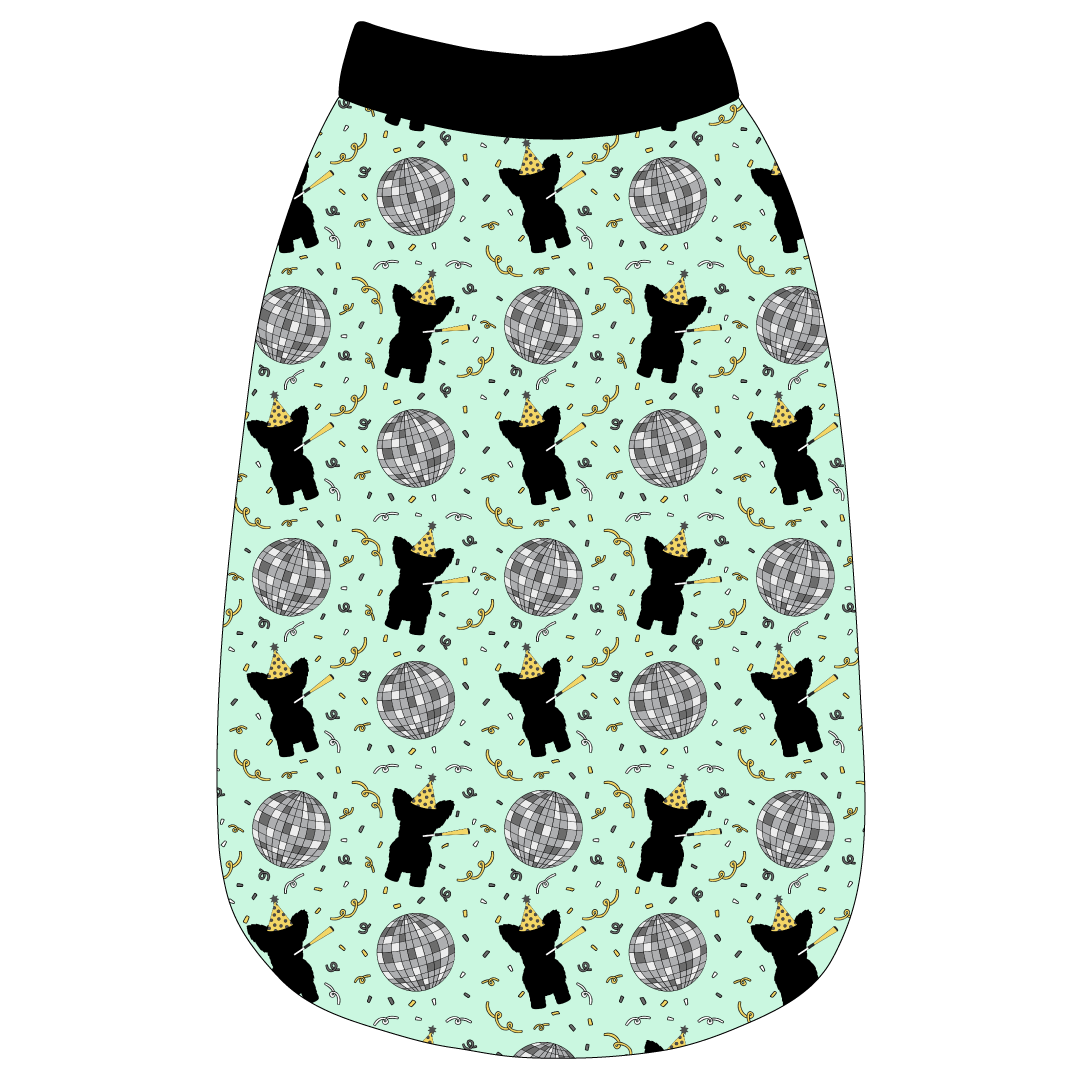 Tank in a dog friendly pattern that shows a mirror ball, dog with a party blower and confetti on a light green background. It's complete with black trim on the neck, waist and shoulders.