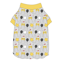 Tee shirt with flutter hem in a dog friendly pattern that shows two happy champagne glasses making a toast with hearts overhead, gold star balloons and traditional balloons in white and gray on a silver sparkle background. It's complete with gold trim on the neck and sleeves.