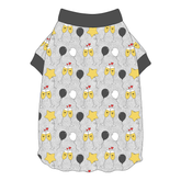 Tee shirt with flutter hem in a dog friendly pattern that shows two happy champagne glasses making a toast with hearts overhead, gold star balloons and traditional balloons in white and gray on a silver sparkle background. It's complete with gray trim on the neck and sleeves.
