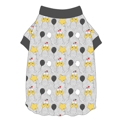 Tee shirt with flutter hem in a dog friendly pattern that shows two happy champagne glasses making a toast with hearts overhead, gold star balloons and traditional balloons in white and gray on a silver sparkle background. It's complete with gray trim on the neck and sleeves.