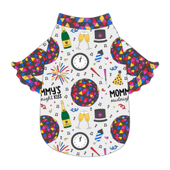 Tee style in a dog friendly pattern that shows a multi-colored New Years ball, the words Mommy's Midnight Kiss, a clock, champagne bottle and champagne toast, fireworks, confetti and more on a white background. It's complete with NYE Ball ruffles on the sleeve edges. NYE Ball trim is also on the neck and waist.