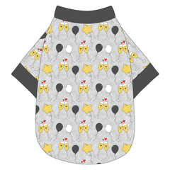 Tee shirt in a dog friendly pattern that shows two happy champagne glasses making a toast with hearts overhead, gold star balloons and traditional balloons in white and gray on a silver sparkle background. It's complete with gray trim on the neck, waist and sleeves