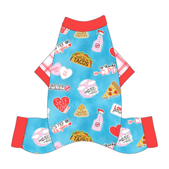 Comfy Pajamas with red and pink plaid sleeves and a dog friendly pattern that shows witty anti-Valentine phrases and fun images. It's complete with solid red trim on the neck, sleeves and legs.