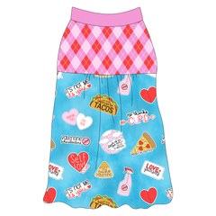 Tank style in a dog friendly pattern that shows witty anti-Valentine phrases and fun images. It's complete with Valentine argyle plaid on the upper back and gathering at the yoke. Solid pink trim is on the neck and shoulders.