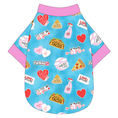 Tee shirt in a dog friendly pattern that shows witty anti-Valentine phrases and fun images. It's complete with solid pink trim on the neck, waist and sleeves.