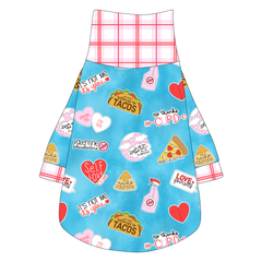 Tee shirt with turtleneck in a dog friendly pattern that shows witty anti-Valentine phrases and fun images. It's complete with red and pink plaid trim on the neck, sleeves and waist.