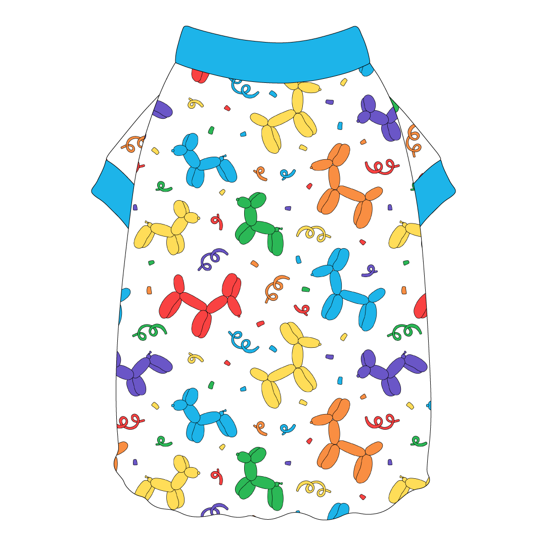 Tee shirt style with flutter hem in a dog friendly pattern that shows party images like balloons and confetti. It's complete with solid blue trim on the neck and sleeves.