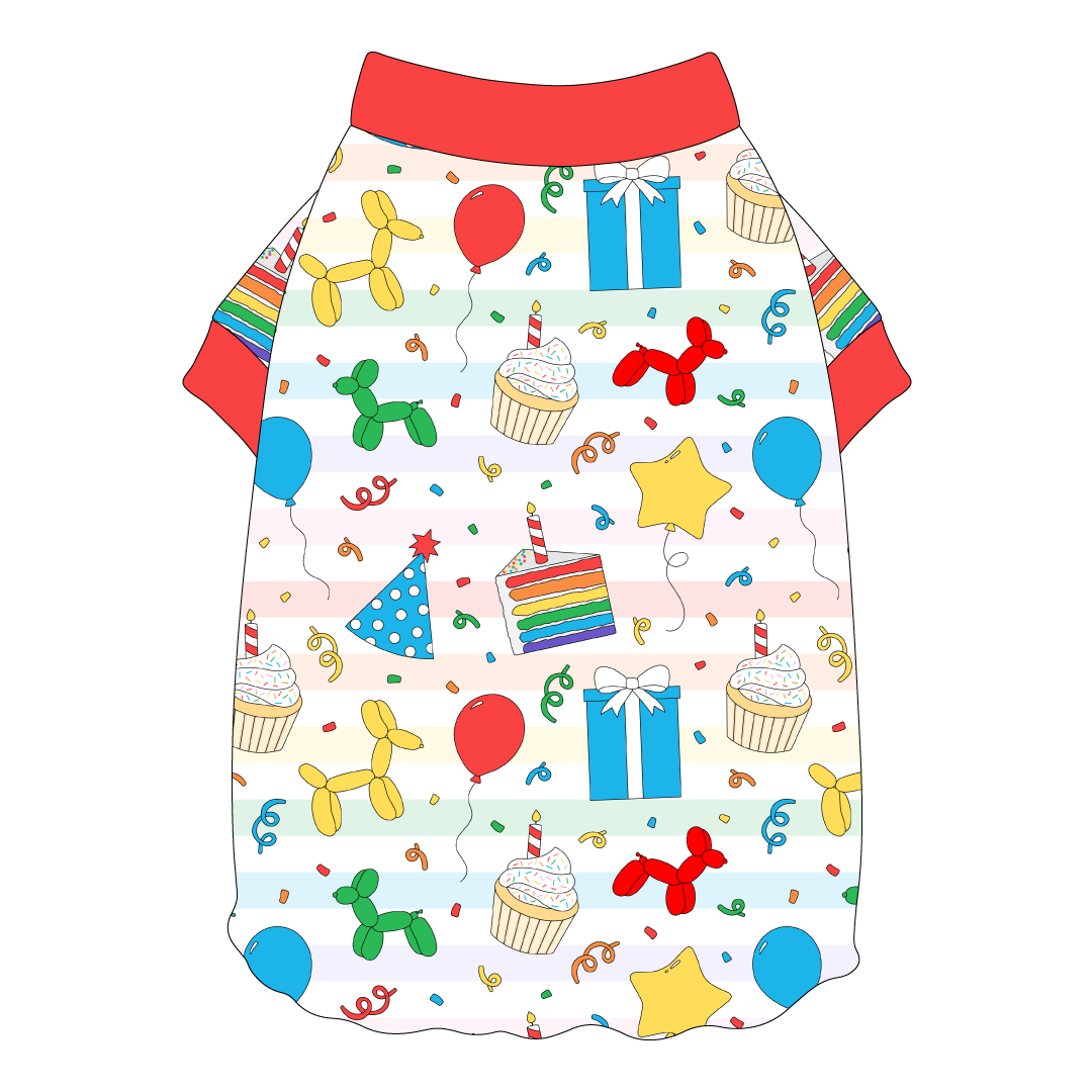 Tee shirt style with flutter hem in a dog friendly pattern that shows party images like balloons, cake, gifts, party hats and more. It's complete with solid red trim on the neck and sleeves.