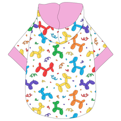 Hoodie in a dog friendly pattern that shows party images like balloons and confetti. It's complete with a hood lined in solid pink trim, which is also found on the sleeve edges and waist.