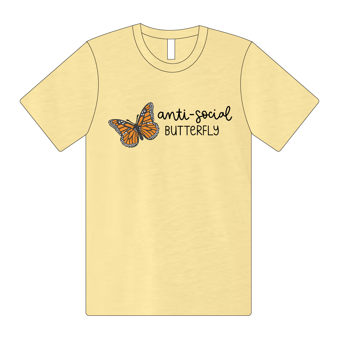 The Bella + Canvas Unisex Tee comes in Pale Yellow. In black lettering, it reads "Anti-Social Butterly".