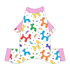 Comfy Pajamas with solid pink sleeves and a dog friendly pattern that shows party images like balloons and confetti. It's complete with Pawty Animal trim on the sleeves and solid pink trim on the neck and legs.