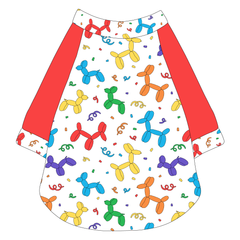 Raglan style tee in a dog friendly pattern that shows party images like balloons and confetti. It's complete with solid red sleeves, with Pawty Animal trim on the sleeve edges, neck and waist.