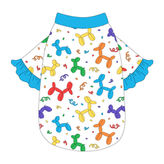 Tee style in a dog friendly pattern that shows party images like balloons and confetti. It's complete with solid blue ruffles on the sleeve edges, as well as trim on the neck and waist.