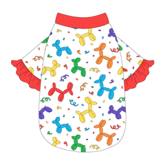 Tee style in a dog friendly pattern that shows party images like balloons and confetti. It's complete with solid red ruffles on the sleeve edges, as well as trim on the neck and waist.