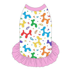 Dress style tank with a girly ruffle skirt in a dog friendly pattern that shows party images like balloons and confetti. It's complete with solid pink trim on the neck, shoulders and ruffles.