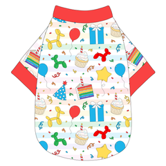 Tee shirt in a dog friendly pattern that shows party images like balloons, cake, gifts, party hats and more. It's complete with solid red trim on the neck, waist and sleeves.