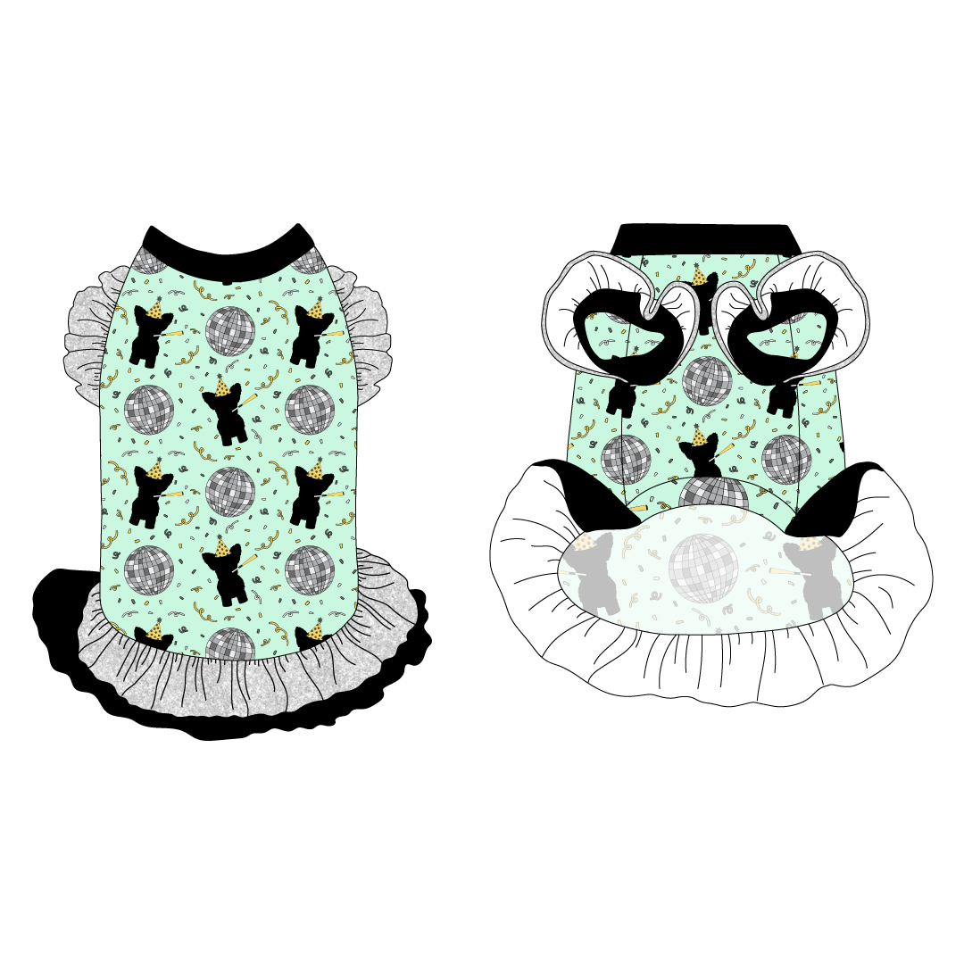 Dress with ruffle accents on the shoulders and girly double ruffle skirt in a dog friendly pattern that shows a mirror ball, dog with a party blower and confetti on a light green background.  It's complete with black trim on the neck, silver sparkle ruffles on the shoulders, a silver sparkle asymmetrical ruffle on top of a black ruffle skirt, as well as a coordinating trim under the shoulder ruffles in black.