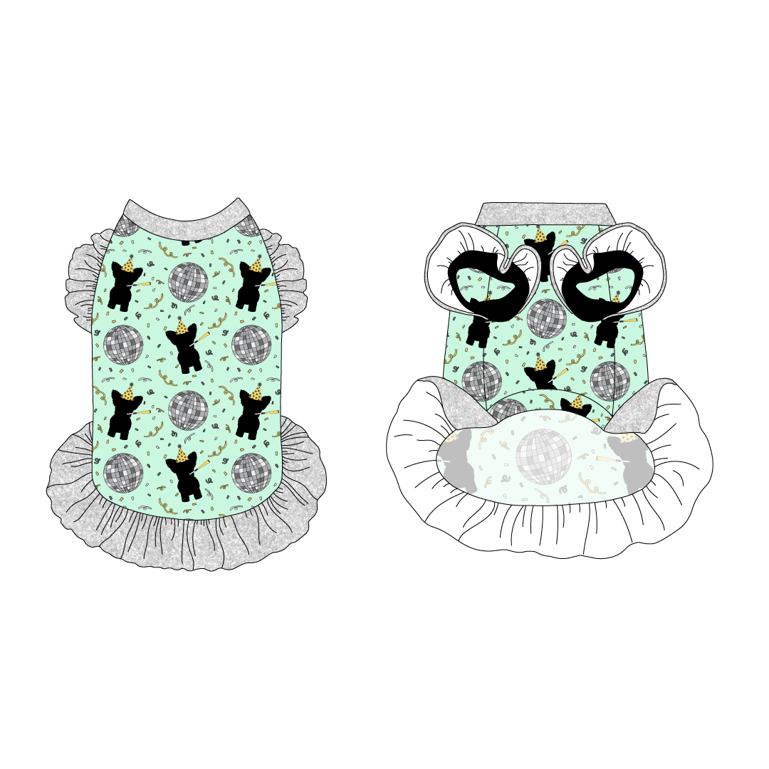 Dress with ruffle accents on the shoulders and girly ruffle skirt in a dog friendly pattern that shows a mirror ball, dog with a party blower and confetti on a light green background.  It's complete with silver sparkle trim on the neck and ruffles, as well as a coordinating trim under the shoulder ruffles in black.