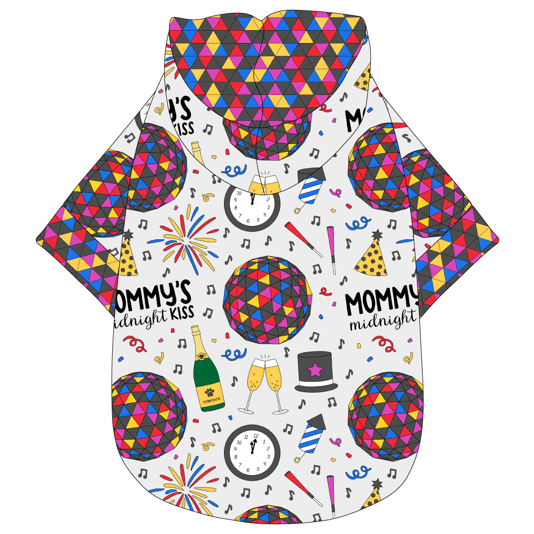 Hoodie in a dog friendly pattern that shows a multi-colored New Years ball, the words Mommy's Midnight Kiss, a clock, champagne bottle and champagne toast, fireworks, confetti and more on a white background.  It's complete with a hood lined in NYE Ball. NYE Ball trim is on the waist and sleeves