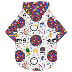 Hoodie in a dog friendly pattern that shows a multi-colored New Years ball, the words Mommy's Midnight Kiss, a clock, champagne bottle and champagne toast, fireworks, confetti and more on a white background.  It's complete with a hood lined in NYE Ball. NYE Ball trim is on the waist and sleeves