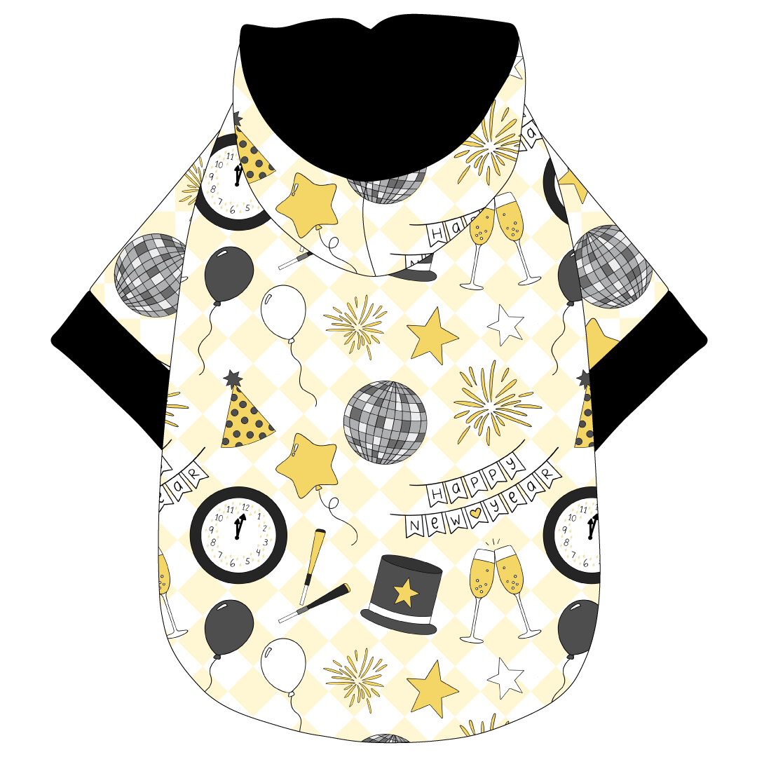 Hoodie in a dog friendly pattern that shows a mirror ball, top hat, champagne toast, balloons, clock striking midnight, banner reading Happy New Year and more on a light gold and white diamond background.  It's complete with a hood lined in black. Black trim is on the waist and sleeves