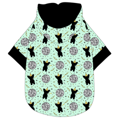 Hoodie in a dog friendly pattern that shows a mirror ball, dog with a party blower and confetti on a light green background.  It's complete with a hood lined in black. Black trim is on the waist and sleeves