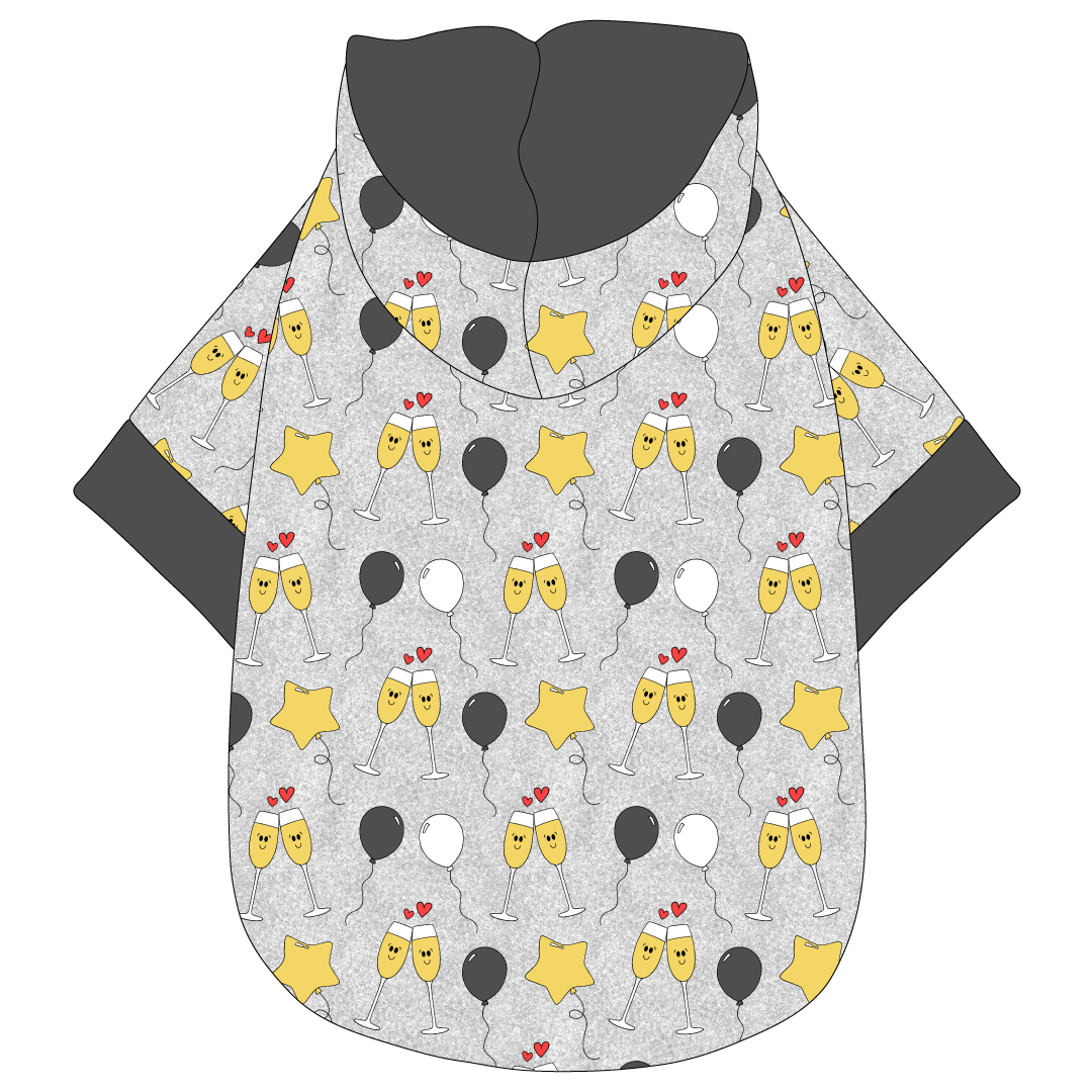 Hoodie in a dog friendly pattern that shows two happy champagne glasses making a toast with hearts overhead, gold star balloons and traditional balloons in white and gray on a silver sparkle background.  It's complete with a hood lined in gray. Gray trim is on the waist and sleeves