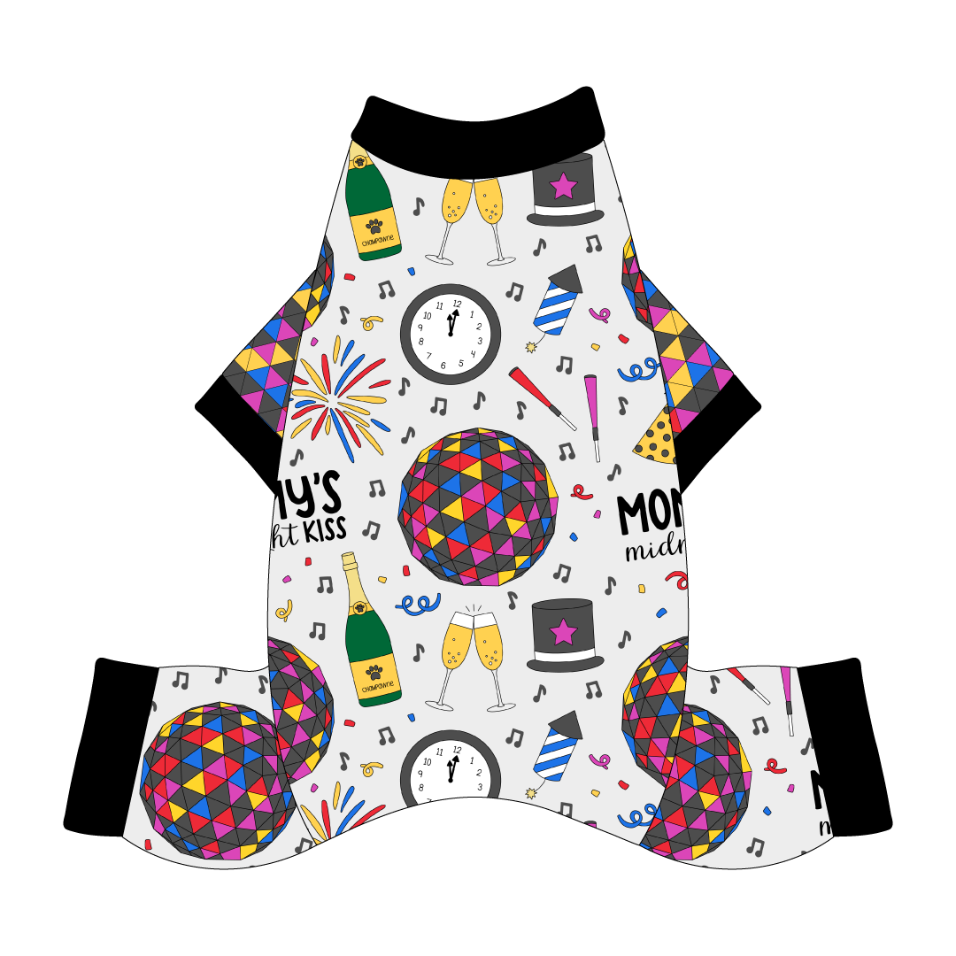 Comfy New Years Pajamas with NYE Ball sleeves in a dog friendly pattern that shows a multi-colored New Years ball, the words Mommy's Midnight Kiss, a clock, champagne bottle and champagne toast, fireworks, confetti and more on a white background.  It's complete with black trim on the neck, sleeves and legs.