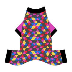 Comfy Christmas Pajamas with solid magenta sleeves and a dog friendly pattern that shows a colorful geometric design that looks like the New Years Eve ball that drops in Times Square. It's complete with black trim on the neck, sleeves and waist.