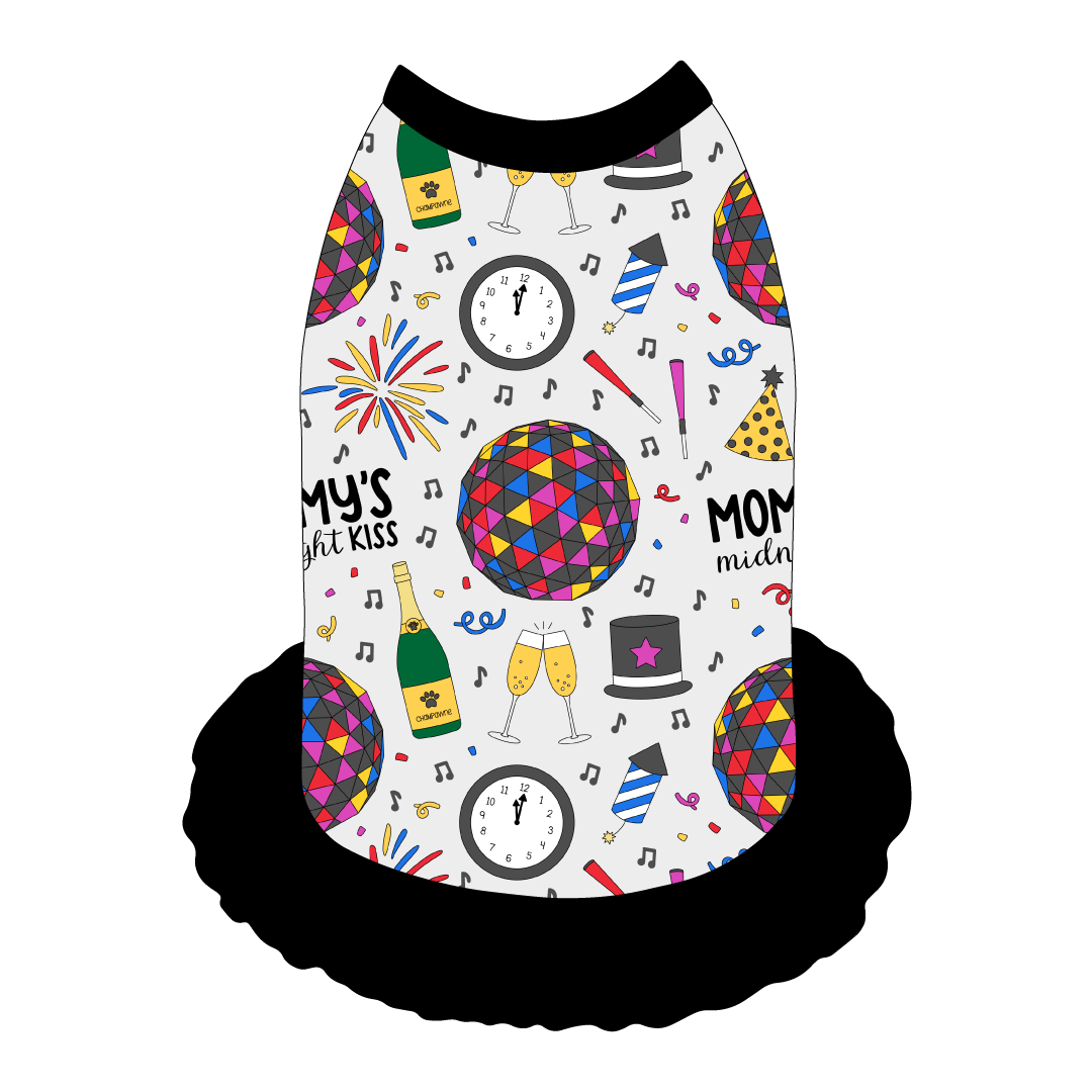 Dress style tank with a girly ruffle skirt in a dog friendly pattern that shows a multi-colored New Years ball, the words Mommy's Midnight Kiss, a clock, champagne bottle and champagne toast, fireworks, confetti and more on a white background.  It's complete with black trim on the neck, shoulders and ruffles.