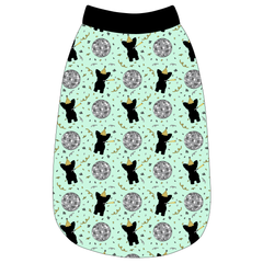 Tank in a dog friendly pattern that shows a mirror ball, dog with a party blower and confetti on a light green background.  It's complete with black trim on the neck, waist and shoulders.