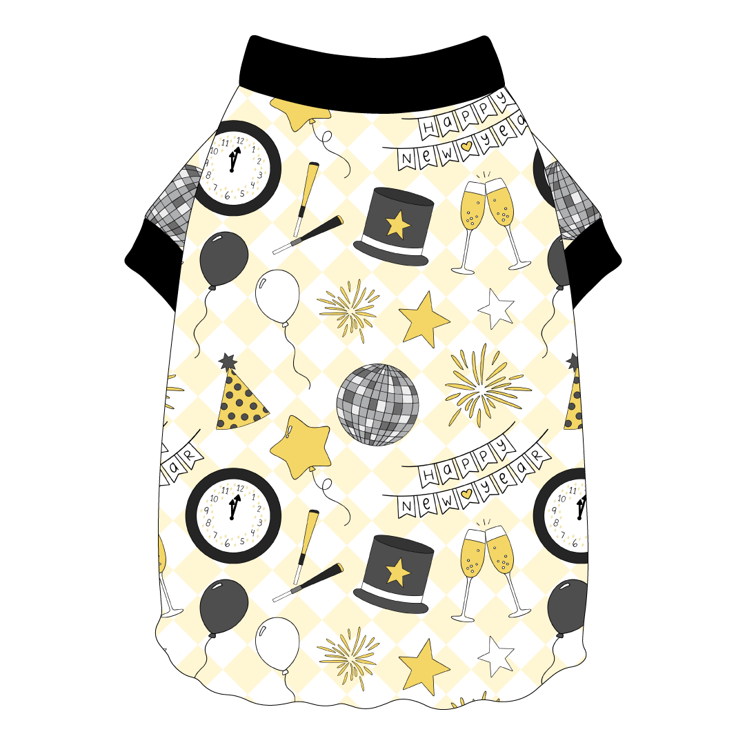 Tee shirt with flutter hem in a dog friendly pattern that shows a mirror ball, top hat, champagne toast, balloons, clock striking midnight, banner reading Happy New Year and more on a light gold and white diamond background.  It's complete with black trim on the neck and sleeves.