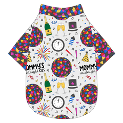 Tee shirt in a dog friendly pattern that shows a multi-colored New Years ball, the words Mommy's Midnight Kiss, a clock, champagne bottle and champagne toast, fireworks, confetti and more on a white background.  It's complete with NYE Ball trim on the neck, waist and sleeves