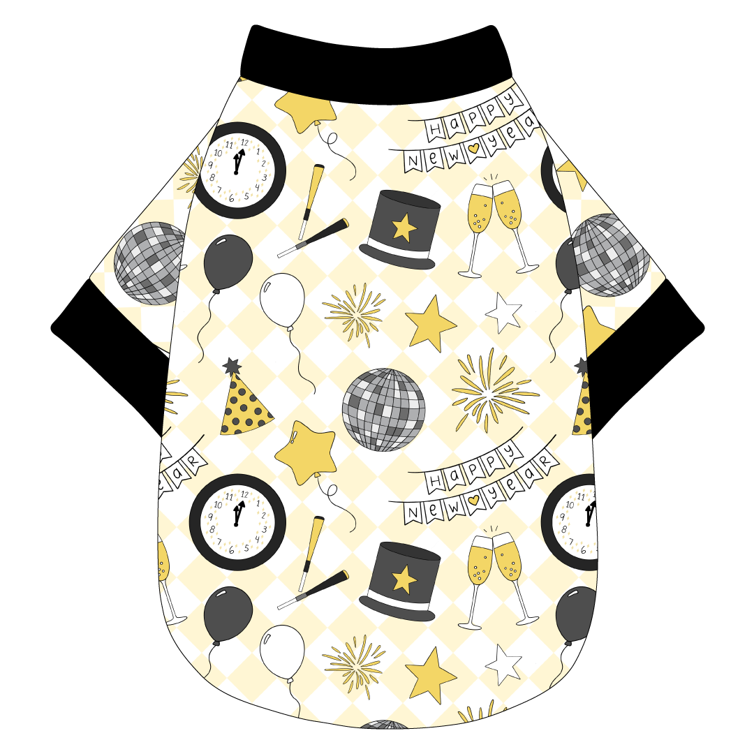 Tee shirt in a dog friendly pattern that shows a mirror ball, top hat, champagne toast, balloons, clock striking midnight, banner reading Happy New Year and more on a light gold and white diamond background.  It's complete with black trim on the neck, waist and sleeves