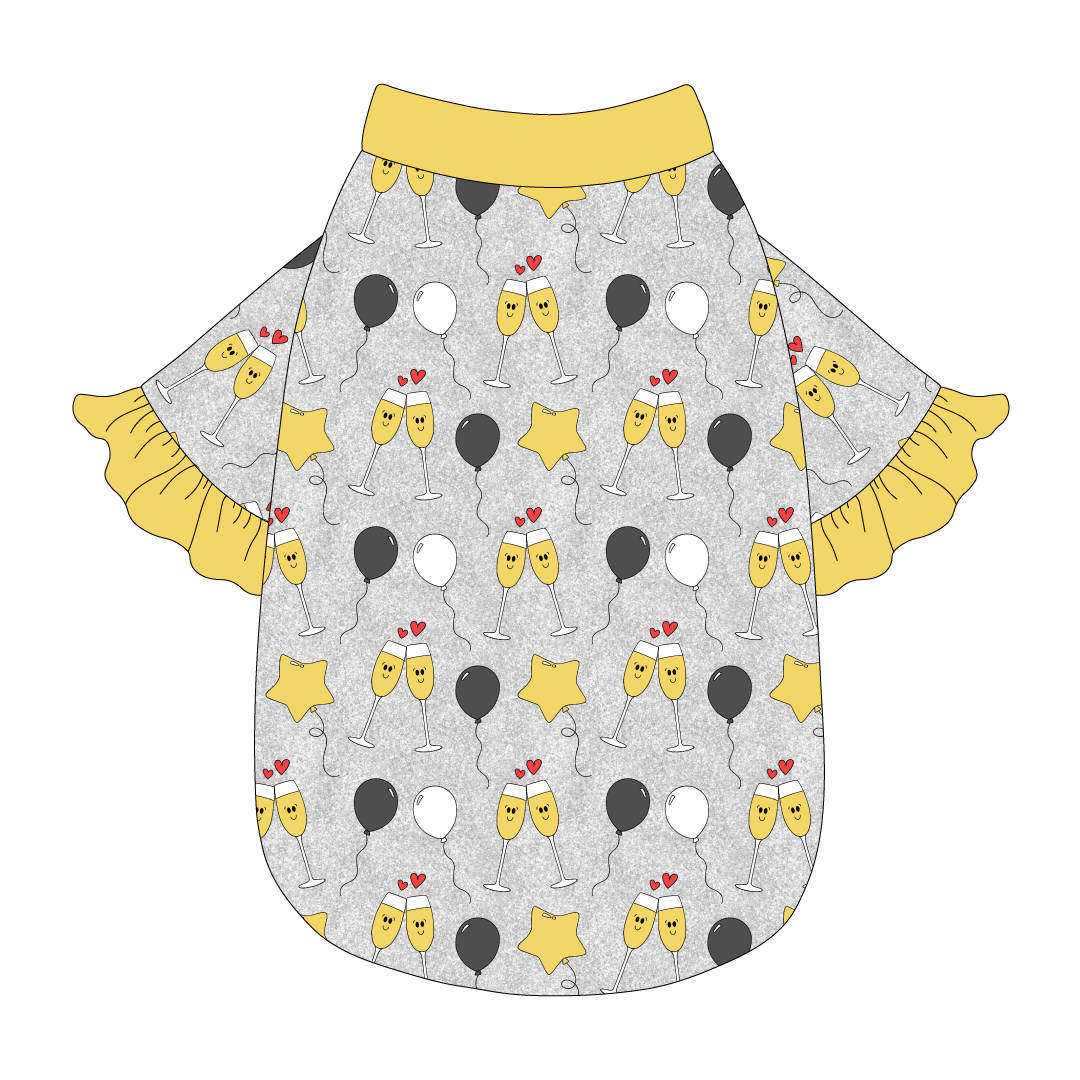 Tee style in a dog friendly pattern that shows two happy champagne glasses making a toast with hearts overhead, gold star balloons and traditional balloons in white and gray on a silver sparkle background. It's complete with gold ruffles on the sleeve edges. Gold trim is also on the neck and waist.