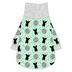 Tee shirt with turtleneck in a dog friendly pattern that shows a mirror ball, dog with a party blower and confetti on a light green background.  It's complete with silver trim on the neck, waist and sleeves.