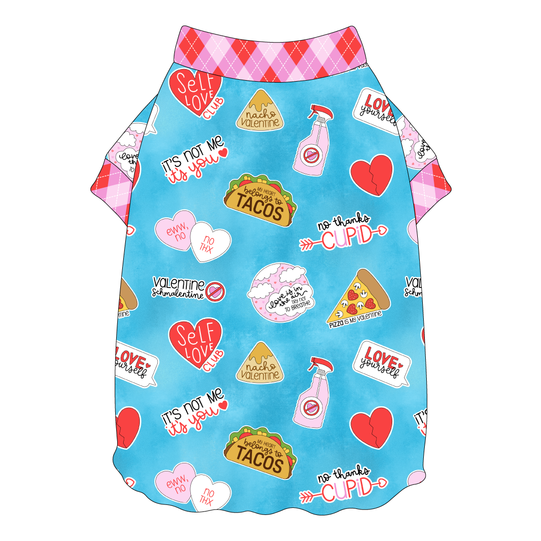 Tee shirt style with flutter hem in a dog friendly pattern that shows witty anti-Valentine phrases and fun images. It's complete with Valentine argyle plaid trim on the neck and sleeves.