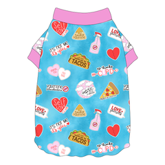 Tee shirt style with flutter hem in a dog friendly pattern that shows witty anti-Valentine phrases and fun images. It's complete with solid pink trim on the neck and sleeves.