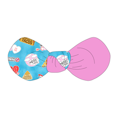 Hair bow twisted with two fabrics: one side in Valentine Schmalentine and one side in solid pink.