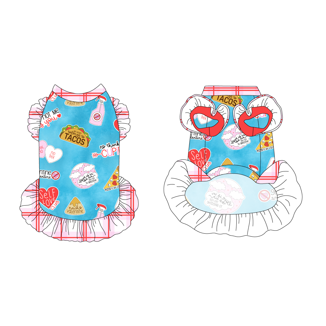 Dress with ruffle accents on the shoulders and girly ruffle skirt in a dog friendly pattern that shows witty anti-Valentine phrases and fun images. It's complete with red and pink plaid trim on the neck and ruffles, as well as a coordinating trim under the shoulder ruffles in solid pink.