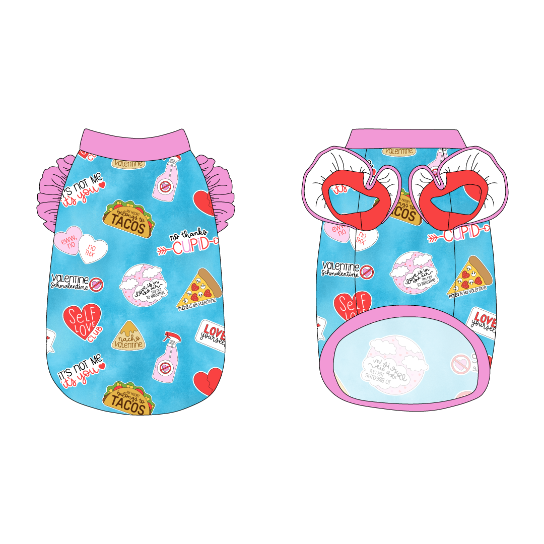 Tank with ruffle accents on the shoulders in a dog friendly pattern that shows witty anti-Valentine phrases and fun images. It's complete with solid pink trim on the neck, waist and shoulder ruffles, as well as a coordinating trim under the shoulder ruffles in solid red.