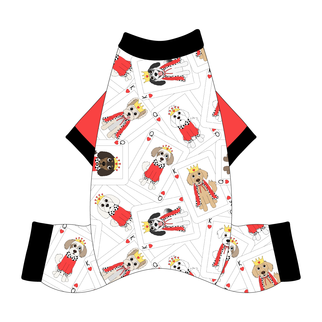 Comfy Pajamas with solid red sleeves and a dog friendly pattern that shows boy and girl dogs dressed as kings and queens on playing cards. It's complete with solid black trim on the neck, sleeves and legs.