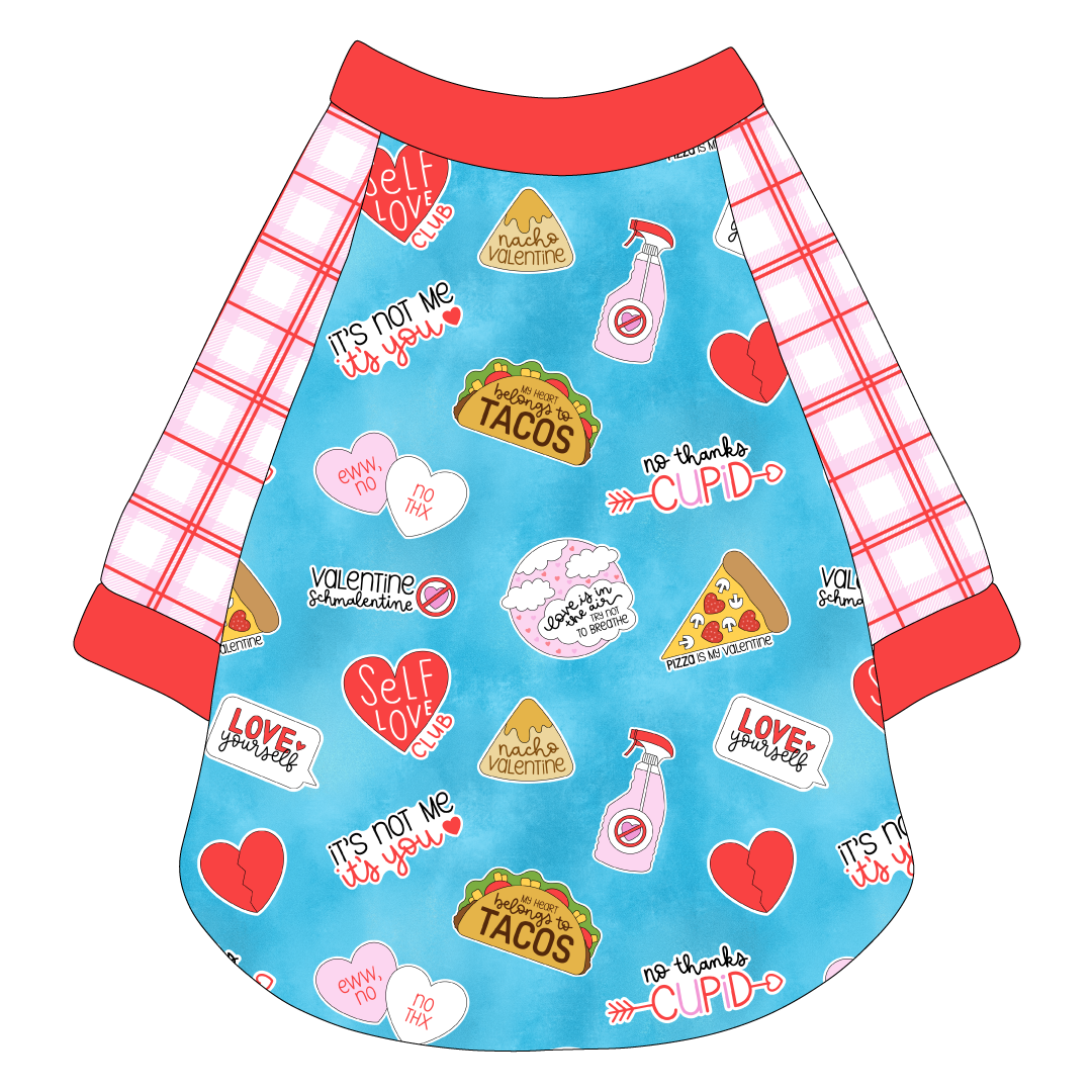 Raglan style tee in a dog friendly pattern that shows witty anti-Valentine phrases and fun images. It's complete with red and pink plaid sleeves, with solid red trim on the sleeve edges, neck and waist.