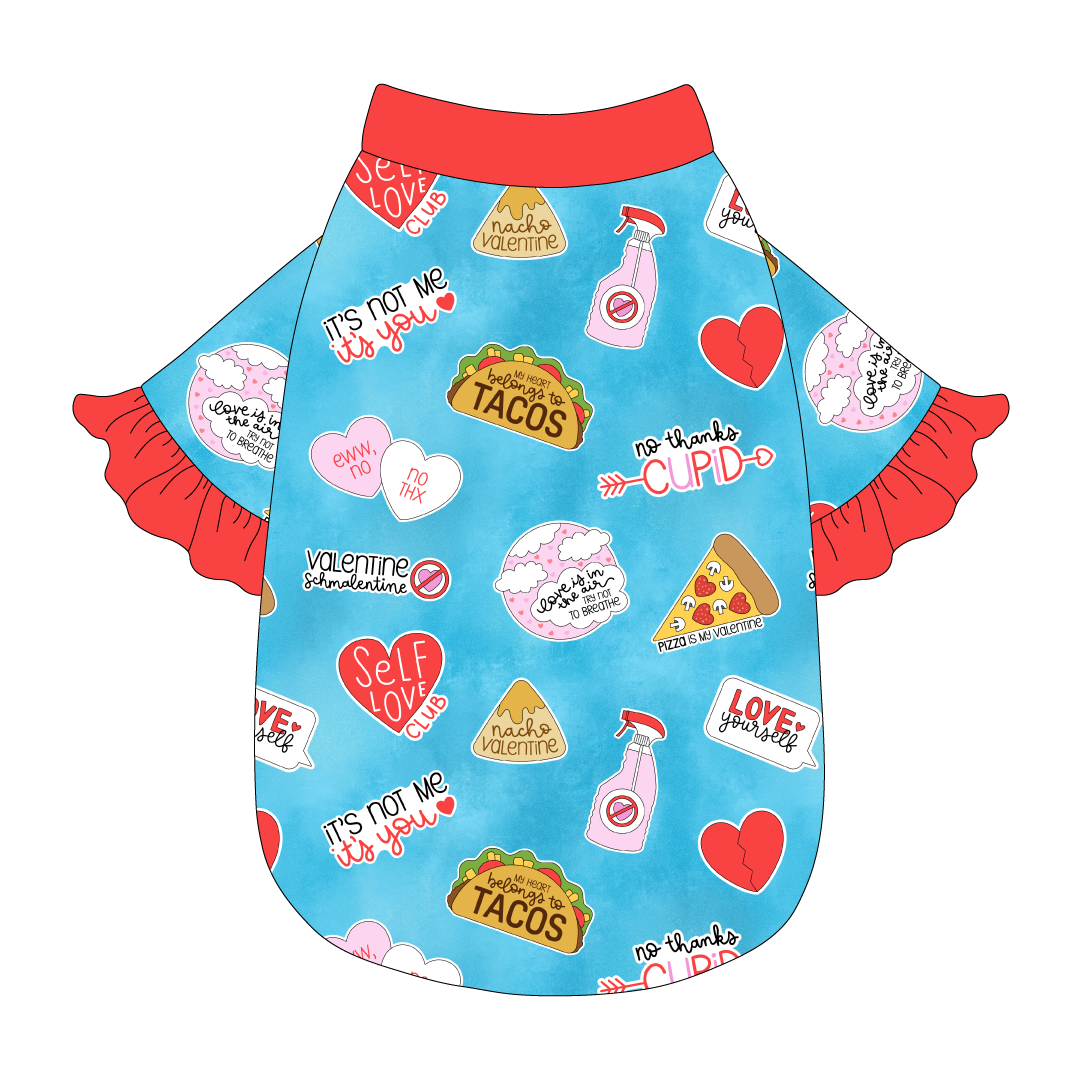 Tee style in a dog friendly pattern that shows witty anti-Valentine phrases and fun images. It's complete with solid red ruffles on the sleeve edges, as well as trim on the neck and waist.