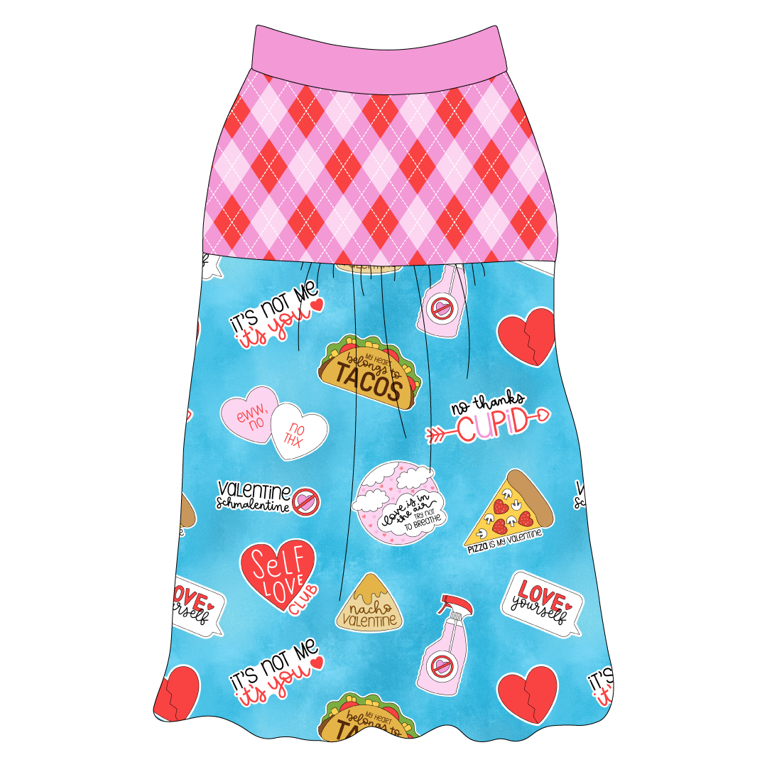 Tank style in a dog friendly pattern that shows witty anti-Valentine phrases and fun images. It's complete with Valentine argyle plaid on the upper back and gathering at the yoke. Solid pink trim is on the neck and shoulders.