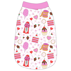 Tank in a dog friendly pattern that shows a variety of sweet treats. It's complete with solid pink trim on the neck, waist and shoulders.