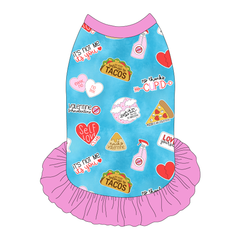 Dress style tank with a girly ruffle skirt in a dog friendly pattern that shows witty anti-Valentine phrases and fun images. It's complete with solid pink trim on the neck, shoulders and ruffles.