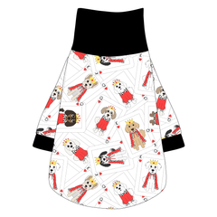 Tee shirt with turtleneck in a dog friendly pattern that shows boy and girl dogs dressed as kings and queens on playing cards. It's complete with solid black trim on the neck, sleeves and waist.