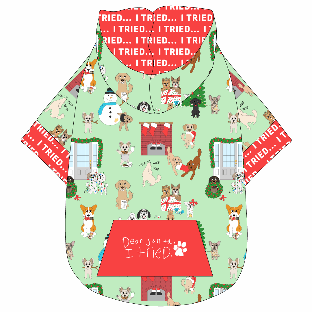 Hoodie in a dog friendly pattern that shows the different dog breeds being naughty at Christmas.  Some are getting in gifts, some knocked over the tree, some are tangled in lights, and more. Design is on a light green background. It's complete with a hood lined in red that reads I Tried in white. Red I Tried trim is on the waist and sleeves, as well as a red pocket that reads Dear Santa, I Tried in child's writing signed with a paw print.